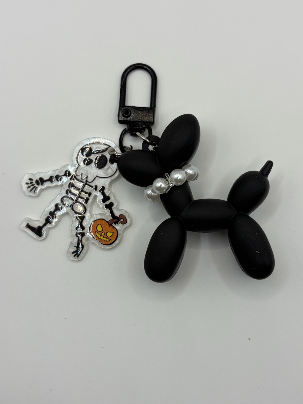 Black Balloon Dog Keychain with Skeleton Charm